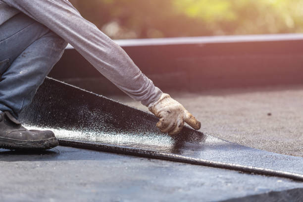 Professional Emergency Waterproofing technician working in Paden City, WV